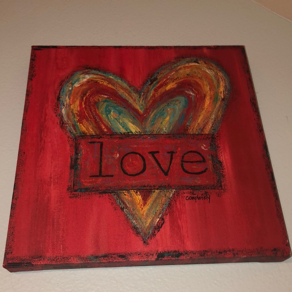 Red heart with love in the middle